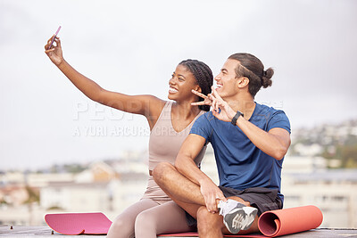 Buy stock photo Couple, fitness and selfie with a peace sign after exercise for a social media post or blog update while outdoor in city with a smile and support. Man and black woman together for a workout in France