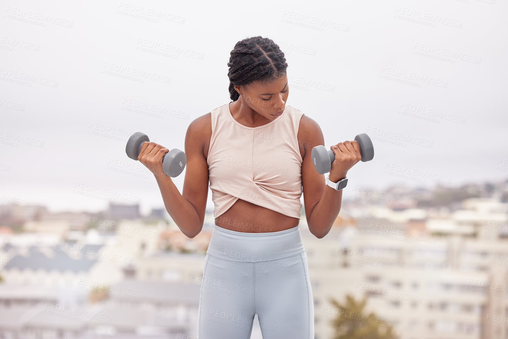 Buy stock photo Muscle, dumbbell and black woman training in the city, rooftop fitness and muscle cardio in Mexico. Workout, health and African girl athlete with weights for bodybuilding, power and strong arms
