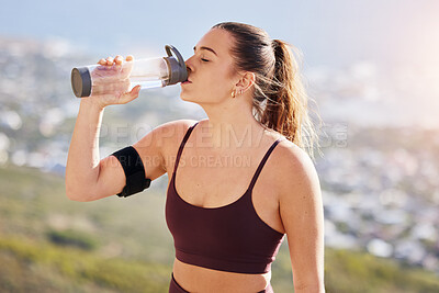 Buy stock photo Water, fitness and drink water after hiking, workout and challenge for health, wellness or nutrition. Young sports, athlete or runner woman with water bottle for exercise, training or hydrate outdoor