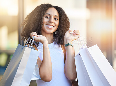 Buy stock photo Shopping, city and black woman in portrait for retail, holiday luxury and wealth with discount, sales and store promotion on fashion. Summer, shopping bag and happy customer at the mall or boutique
