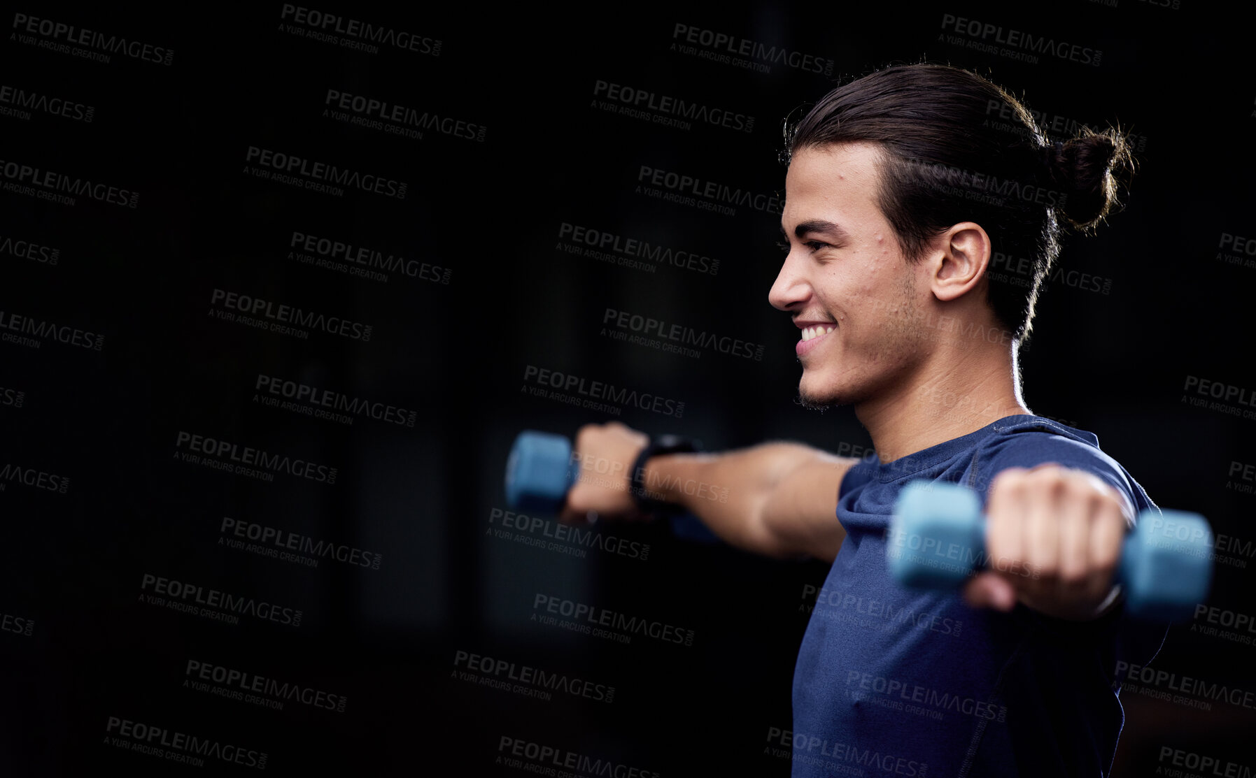 Buy stock photo Man, fitness and dumbbells with smile by black background for health, wellness or muscle development. Happy young bodybuilder, weightlifting or workout for strong arms, training or exercise in studio
