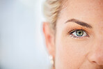Half face, eyes and woman with mockup, focus and vision, awareness and natural cosmetics in Ireland. Closeup portrait of female, lady and seeing human with mock up, healthy perception and eye test