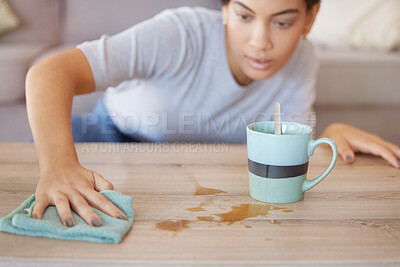 Buy stock photo Cleaning surface, coffee spill and woman wipe furniture, coffee table and counter in living room with cloth. Housekeeping, hygiene and young woman with rag for liquid mess, dirt and stain from tea