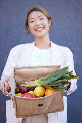 Buy stock photo Grocery shopping, vegetables and woman with a bag in the city, supermarket food and happy with sale from the fruit store. Produce, smile and Asian girl show groceries with nutrition for diet