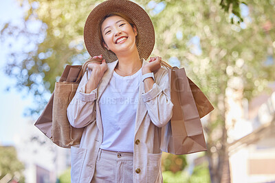 Buy stock photo Asian woman, shopping and smile with bags for outdoor retail experience, buying or purchase in fashion. Happy Japanese female shopper smiling in happiness for wealth, style and clothing outside