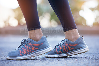 Buy stock photo Shoes, fitness and feet of a woman in the street, cardio training and running for health in the city of Switzerland. Exercise, start and legs of an athlete in the road for sports, walking and workout