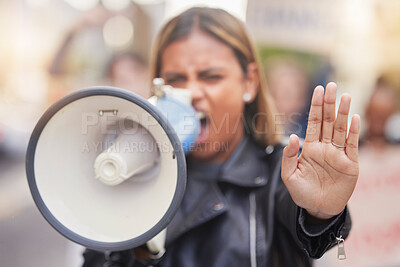 Buy stock photo Woman, megaphone and hand in protest to stop gender based violence, discrimination or equality in the city. Angry female activist shouting, protesting or announcement for human rights or awareness