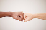Fist bump, support and hands of people or friends together for justice, freedom and diversity with trust, collaboration and motivation on white background. Men together for power at peace protest