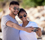 Couple, smile and selfie on summer vacation, holiday and travel adventure together with love, care and happiness. Happy couple, man and woman with sunglasses taking mobile photo outdoor for memory 