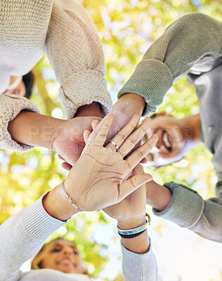 Buy stock photo Hands stack, support with trust and team building outdoor, commitment and solidarity, group of people for development and growth. Team, collaboration and agreement, community and hand palm low angle.