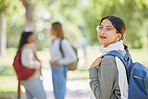 School, campus and student in a park for education, knowledge and learning on a college scholarship in Canada. Nature, smile and portrait of a girl at university for future, motivation and studying