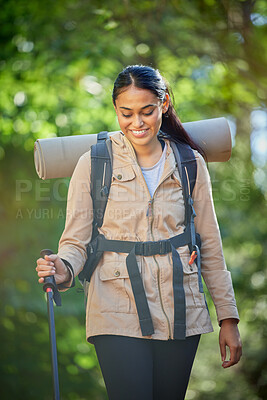 Buy stock photo Hiking, travel and woman with trekking pole for stability or mobility outdoors. Freedom, adventure or happy female hiker from India exercise or training with walking stick for tough terrain in nature