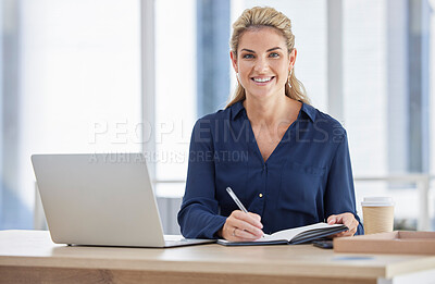 Buy stock photo Portrait, business woman and writing in book in office with laptop on desk. Face, notes and happy female manager from Canada with notebook, diary or journal for schedule, marketing ideas or planning.