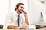Call center, online support and man in telemarketing with smile while consulting, listening and reading email on computer. Crm, communication and customer service worker in technical support with pc