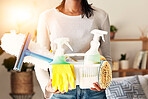 Woman, hands and cleaning detergent tools for domestic housework, hygiene or disinfection at home. Hand of cleaner holding clean supplies in basket for housekeeping, maintenance or spring cleaning