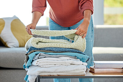 Buy stock photo Woman, hands or laundry fold on home or hotel living room table in healthcare housekeeping, hygiene maintenance or hospitality cleaning. Maid, worker or housewife and washing clothes, towel or fabric