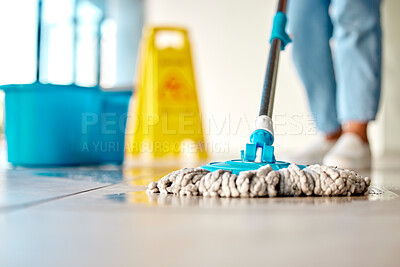 Buy stock photo Mop, cleaner and washing wet floor for hygiene, disinfection or sanitary area for cleanliness at the workplace. Housekeeper cleaning dirty flooring for sanitization, water or wash indoors