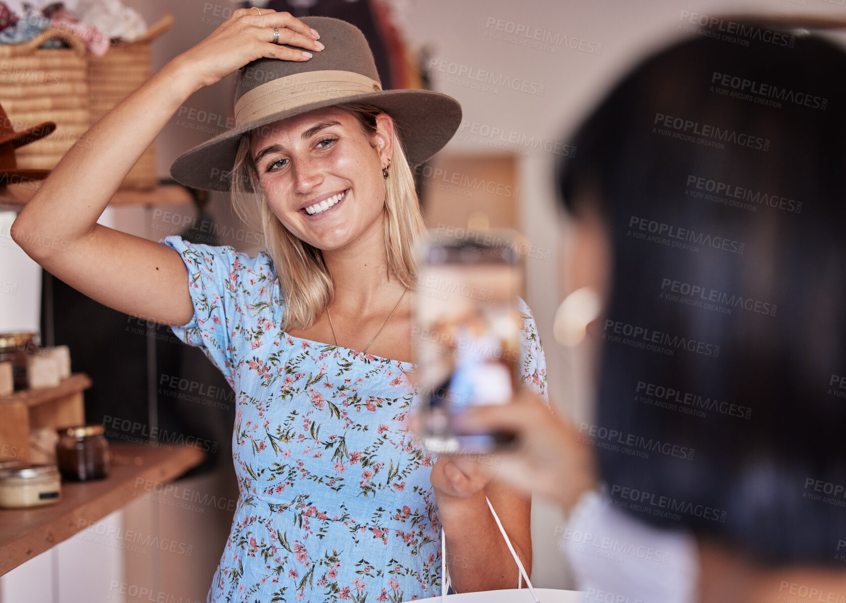 Buy stock photo Fashion, friends shopping and taking pictures with phone for happy memory, profile picture or social media. Retail mall, sales deals and women or girls trying hats and taking mobile smartphone photo.