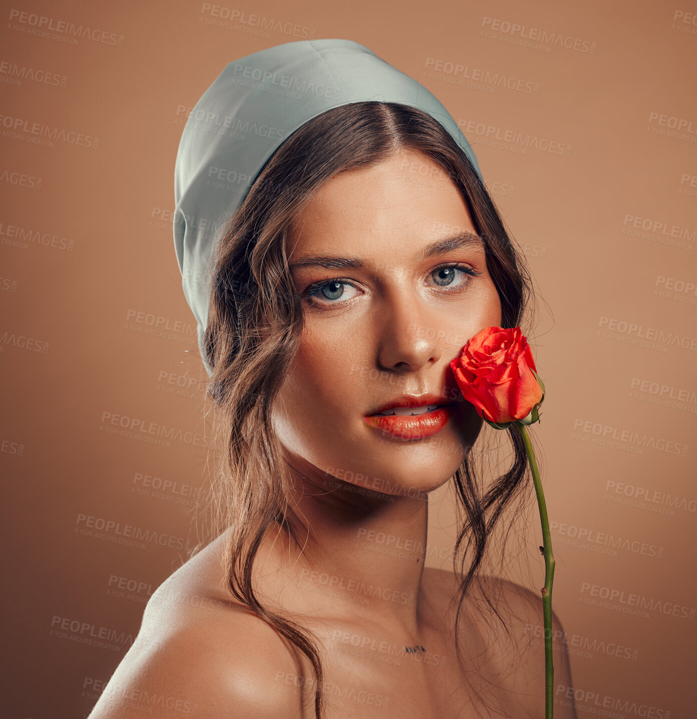 Buy stock photo Rose, woman and face with natural beauty, skincare and luxury cosmetics of floral aesthetic, perfume or facial makeup on studio background. Headshot, portrait and model with roses, nature and flowers