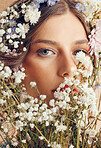 Woman, beauty and flower portrait for natural skincare, cosmetics makeup and floral head crown. Spring flowers, organic body care and skin wellness with facial headshor or dermatology glow in studio