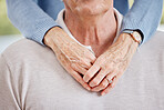 Closeup, married couple and senior hands hug partner in happy relationship of love, care or support together. Closeup elderly man, old woman and people in retirement hugging for comfort, bond and age