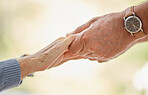 Holding hands, support and trust with senior couple, love and solidarity with helping hands and partnership outdoor. Help, commitment and faith, elderly people with hand holding, together and love.