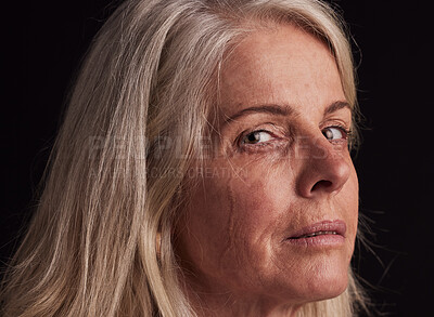Buy stock photo Retirement, depression and portrait of woman with sad tear on face crying with sorrow zoom. Depressed, pension and senior person with mental health problem at black studio background.

