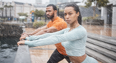 Buy stock photo Portrait, couple in the rain or stretching for workout, fitness or wellness. Wet, man or woman training, practice routine or motivation for health, commitment or sports for energy, cardio or exercise