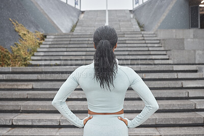 Buy stock photo Stairs, running and black woman runner fitness ready for workout and steps training with motivation. Back view of a woman before wellness exercise, sports and athlete challenge for a healthy body