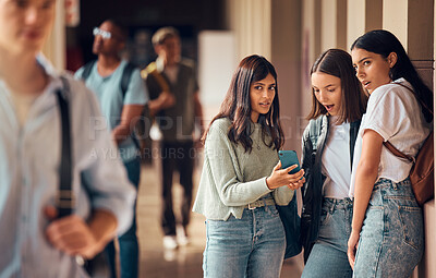 Buy stock photo College friends, phone and gossip or fake news about students on social media, internet and mobile app with teenager group talking. Smartphone bullying post of male and female people at university