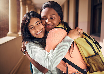 Buy stock photo University, friends and students hug in campus, bonding and care. Love, women and girls from college embrace, cuddle or hugging at school in hallway in support for education, learning and knowledge.