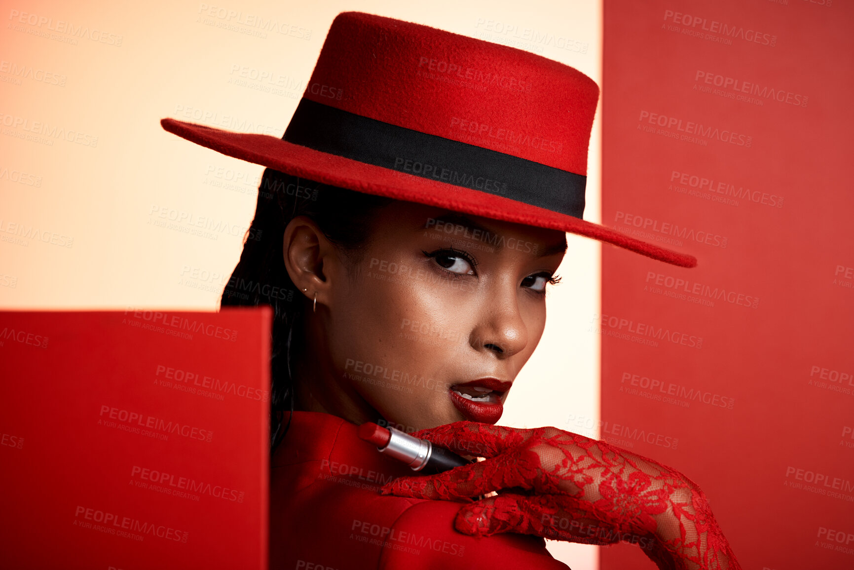 Buy stock photo Fashion, red aesthetic and woman with lipstick in studio for beauty products, designer cosmetics and makeup. Creative art, luxury clothes and portrait of girl with trendy, edgy and elegant outfit