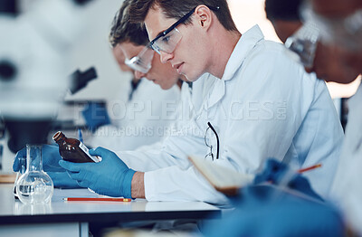 Buy stock photo Science, education and students in laboratory with medicine for chemistry, biotechnology and biology lesson. University, healthcare and group of learners for lab test, exam and experiment with liquid