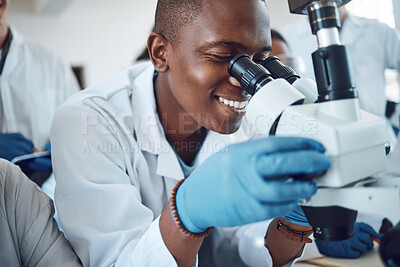 Buy stock photo Science, microscope and students learning in class, classroom physics and happy with research in a lab. Innovation, scientist and African teenager in high school studying microbiology for education