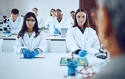 Buy stock photo University, education and science students with professor in classroom. College books, learning and group of people, men and women in lab coats with teacher, lecturer or educator studying biology.