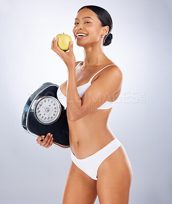 Buy stock photo Woman, lingerie or body and diet apple, weight loss scale or healthy food for fat management, training success or Brazilian fitness. Portrait, smile or happy underwear model with fruit for nutrition