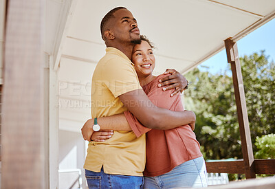 Buy stock photo Black couple, bonding and love hug in house or home patio as new property owners, mortgage investment success or real estate buyers. Smile, happy and embrace man and woman with future security goals