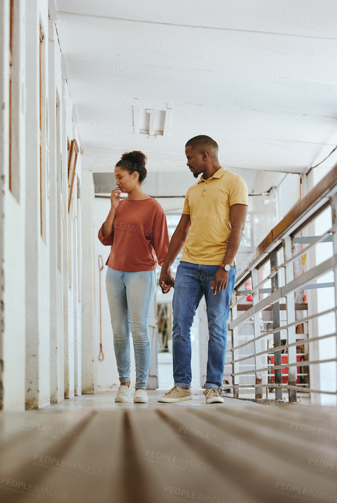 Buy stock photo Black couple, bonding or love in animal shelter, pet kennel or foster care clinic in homeless community support or volunteer work. Woman, man or holding hands, dog adoption shop or thinking of rescue