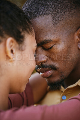 Buy stock photo Love, intimate and black couple hugging on a date for romance, care and intimacy together. Romantic, loving and young African man and woman embracing on a summer honeymoon vacation, holiday or trip.