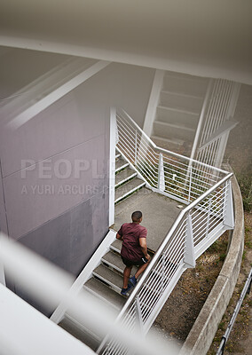 Buy stock photo Running, fitness and top view of black man on stairs for health, wellness and exercise. Sports, training and male runner jog, exercising or cardio workout on steps outdoors for strength and endurance