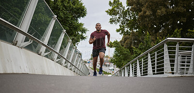 Buy stock photo Health, black man and running for fitness, workout and training for marathon, wellness or endurance. African American male, athlete or runner outdoor, exercise and practice for competition or balance