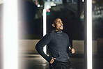 African runner man, night and city for training, speed exercise or wellness on dark street with focus. Black man running, evening workout and urban metro for fitness, balance or fast run in Cape Town