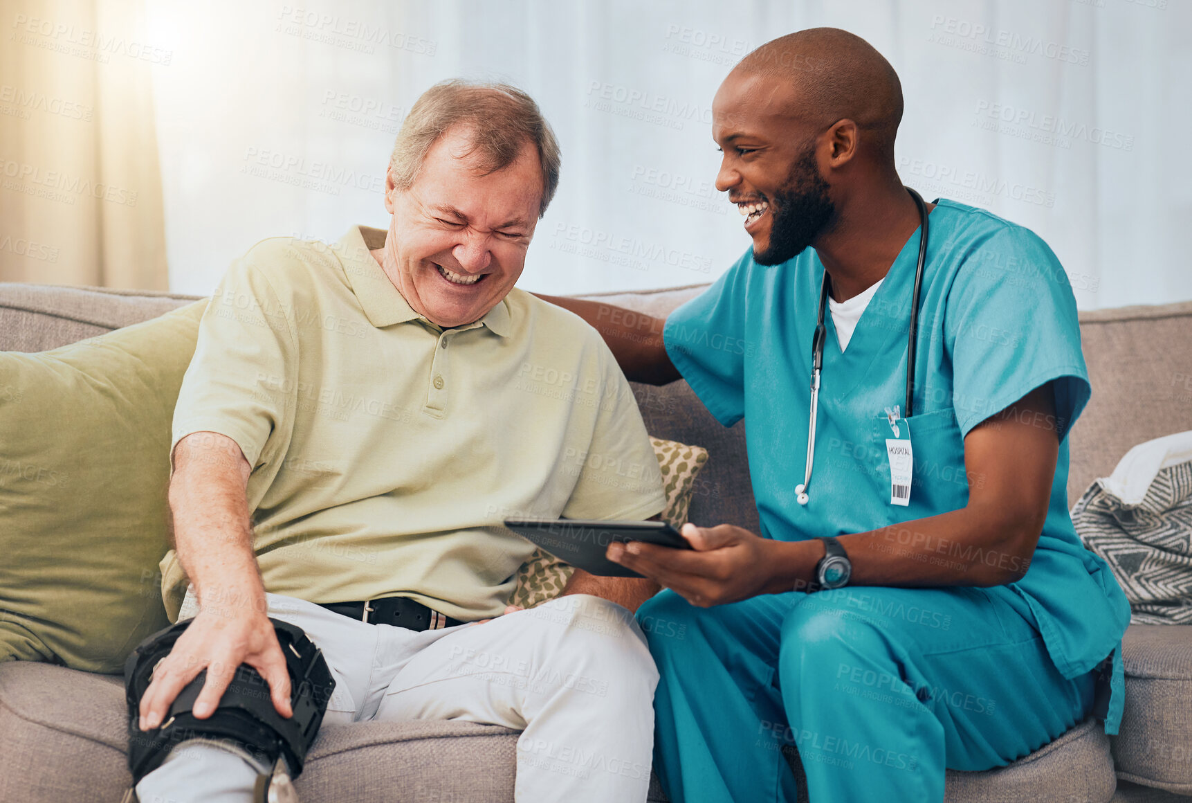 Buy stock photo Rehabilitation, knee pain and man and nurse with tablet for recovery results, patient report and scan at home. Healthcare, support and happy medical worker with senior man laughing in consultation