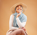 Hijab, fashion and happy woman thinking on studio background, trendy hat and summer style. Laughing, happiness and mature muslim model, islamic culture and beauty for positive mindset, ideas or smile