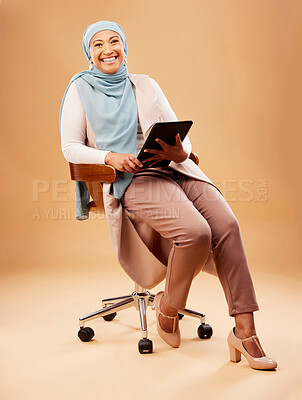 Buy stock photo Muslim, woman and tablet technology on studio background for website, internet search and online app in chair. Happy portrait, islamic hijab and mature lady, model and digital connection in Malaysia