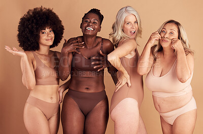 Buy stock photo Lingerie, body positivity and women smile for diversity, self love and inclusive clothes against a brown studio background. Decision, happy and crazy portrait of small and plus size underwear model