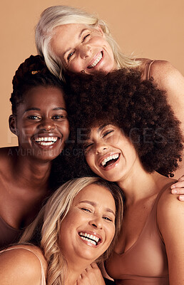 Buy stock photo Diversity, beauty and natural with woman friends in studio on a beige background to promote skincare. Portrait, face and smile with a happy female and friend group indoors for luxury cosmetics