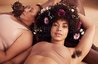 Buy stock photo Armpit hair, confidence and floral black woman with natural beauty, body health and happy in skin with a group of women in studio. Creative, flower crown and portrait of a model with hairy underarm