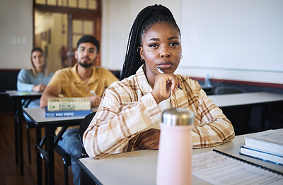 Buy stock photo University, education and thinking with a student black woman in class during a lecture or lesson for learning. Study, school or scholarship with a female pupil sitting in a classroom for development