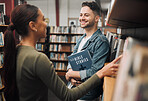 Woman, man and library for reading, talking and knowledge for studies. Students, male and female in bookstore, education or research for literature, study and for books to read, conversation or smile
